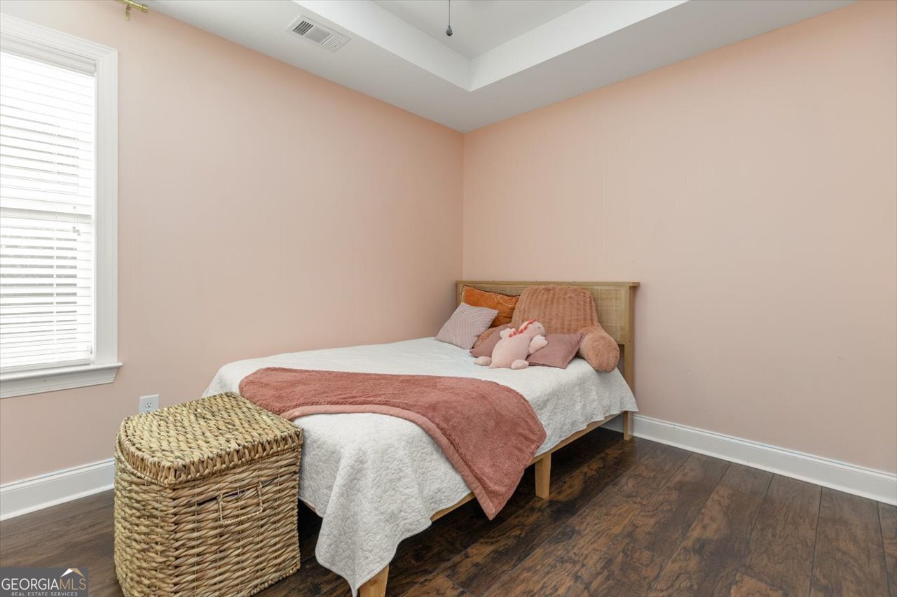 207 Kendall Court Perry, GA 31069 - Photo 37 of 45 a bedroom with a bed and window