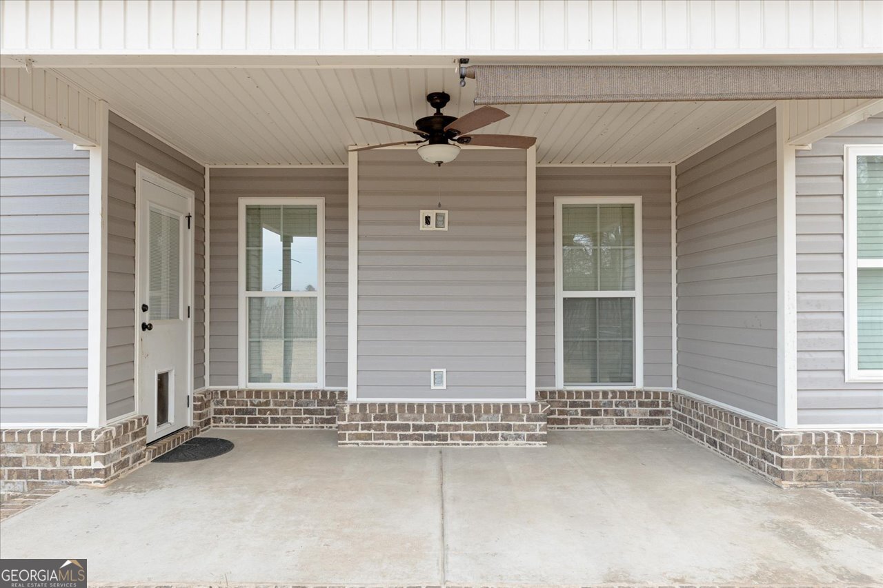 207 Kendall Court Perry, GA 31069 - Photo 40 of 45 a view of a house with wooden fence