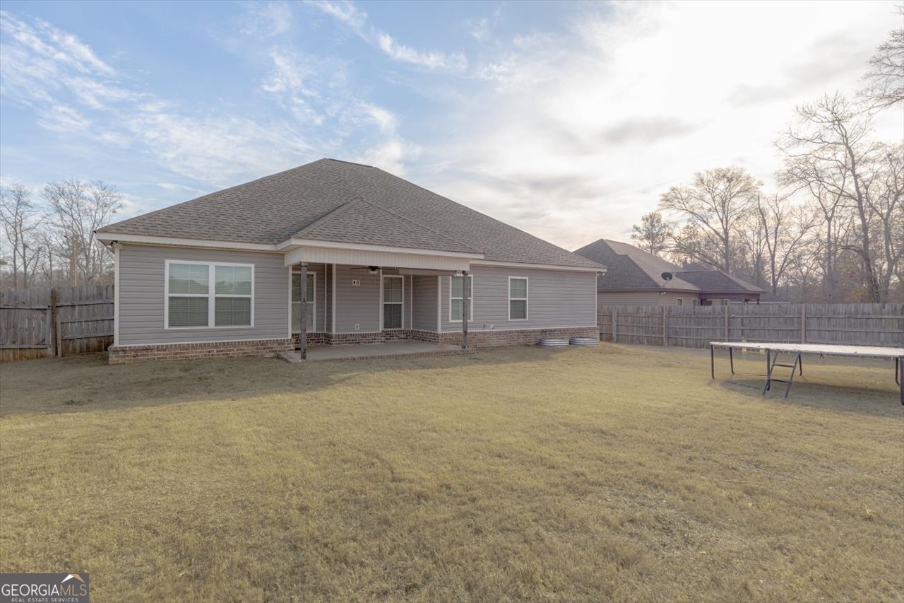207 Kendall Court Perry, GA 31069 - Photo 42 of 45 front view of a house with a yard