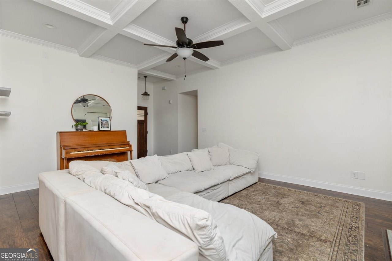 207 Kendall Court Perry, GA 31069 - Photo 10 of 45 a living room with furniture and a ceiling fan