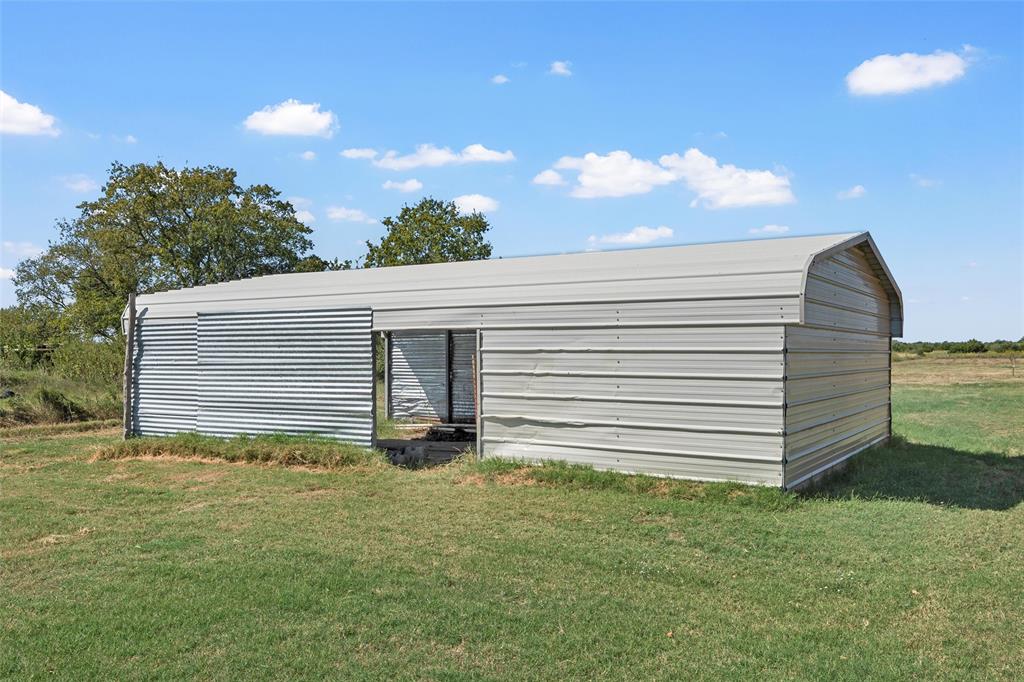 3449 Bluhm Road West, TX 76691 - Photo 34 of 40 a view of a backyard