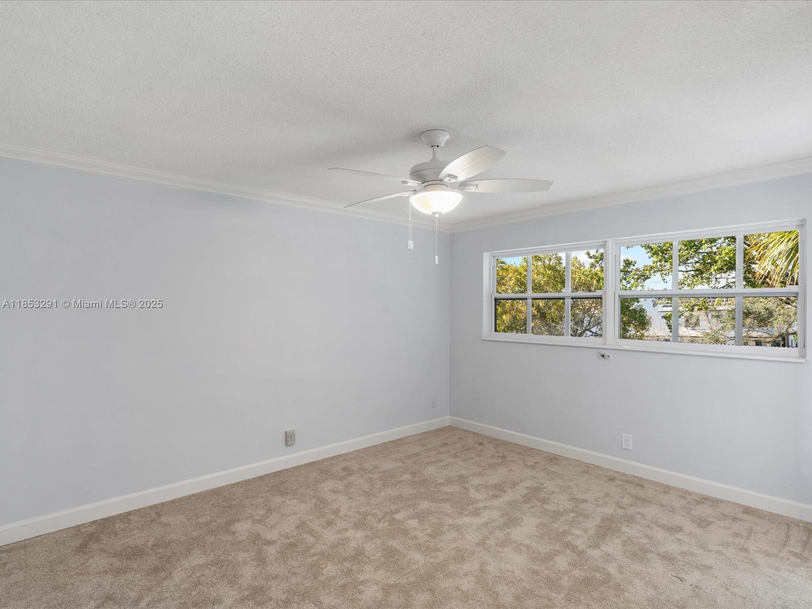 200 Northeast 12th Avenue, Unit 7C Hallandale Beach, FL 33009 - Photo 15 of 27 an empty room with a window