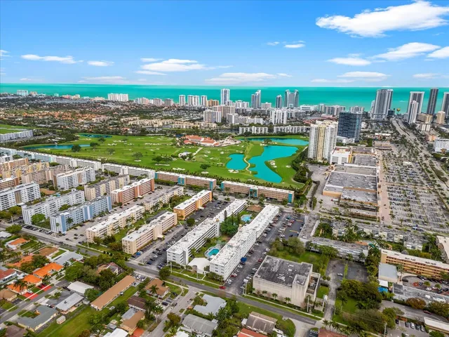 a view of a city with a lake