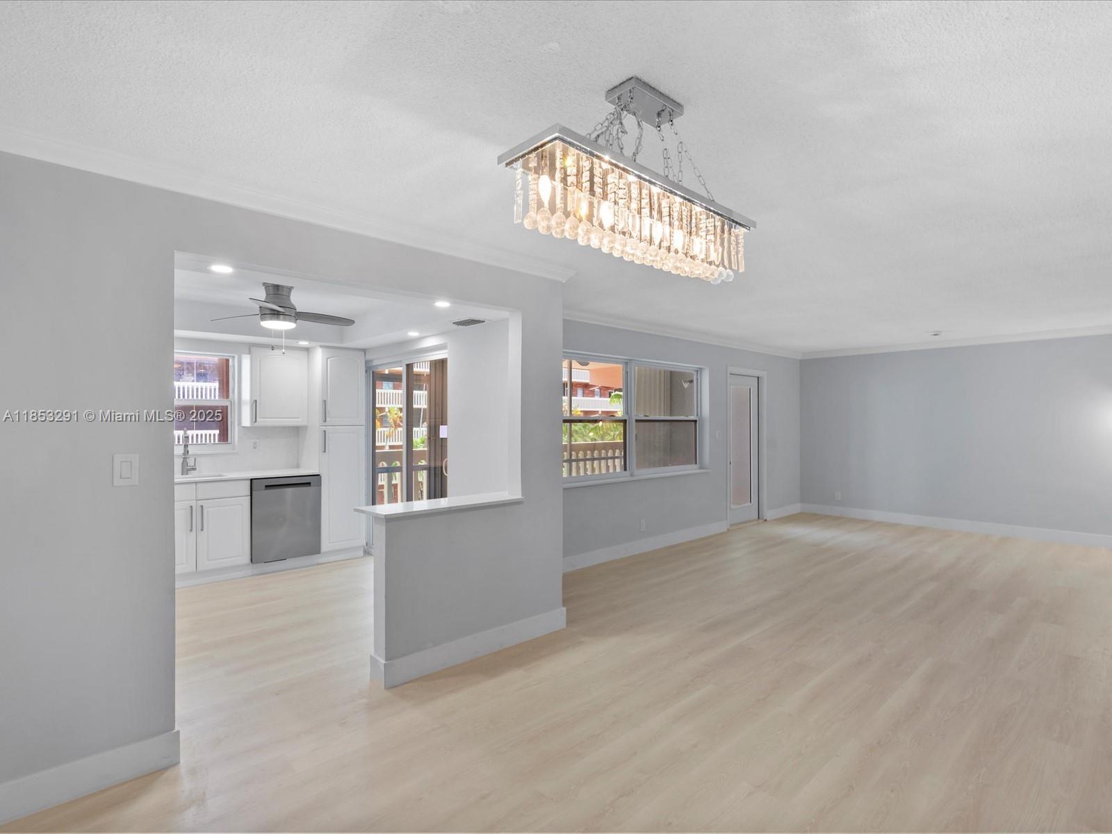 200 Northeast 12th Avenue, Unit 7C Hallandale Beach, FL 33009 - Photo 5 of 27 a view of an empty room and window