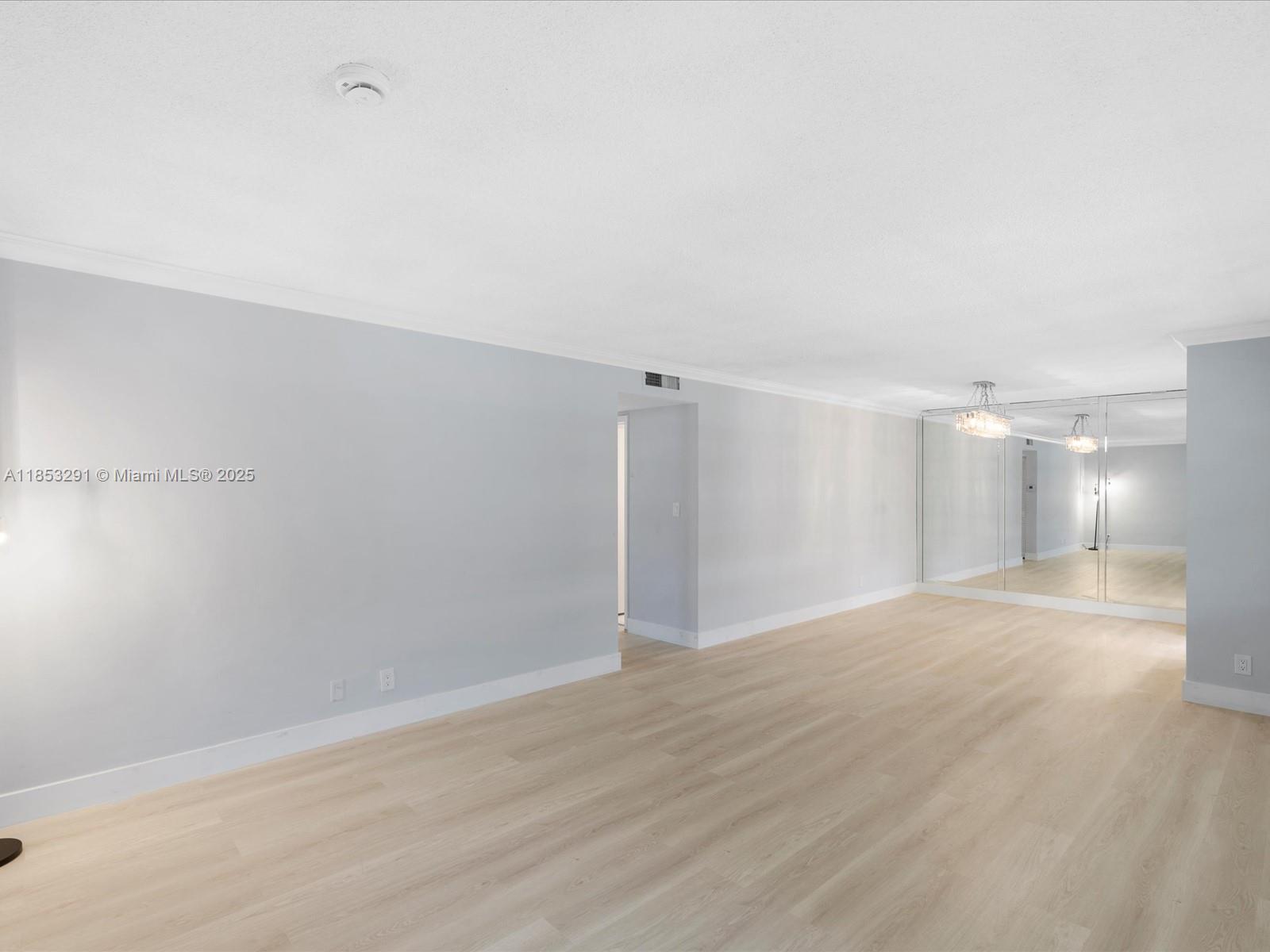 200 Northeast 12th Avenue, Unit 7C Hallandale Beach, FL 33009 - Photo 8 of 27 a view of an empty room