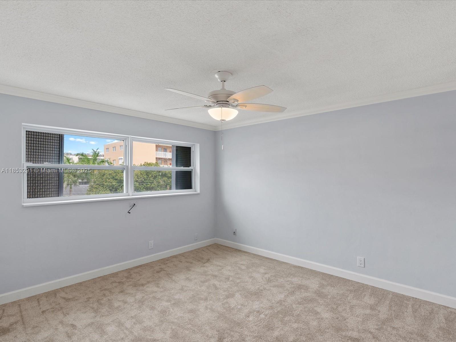200 Northeast 12th Avenue, Unit 7C Hallandale Beach, FL 33009 - Photo 10 of 27 an empty room with a window