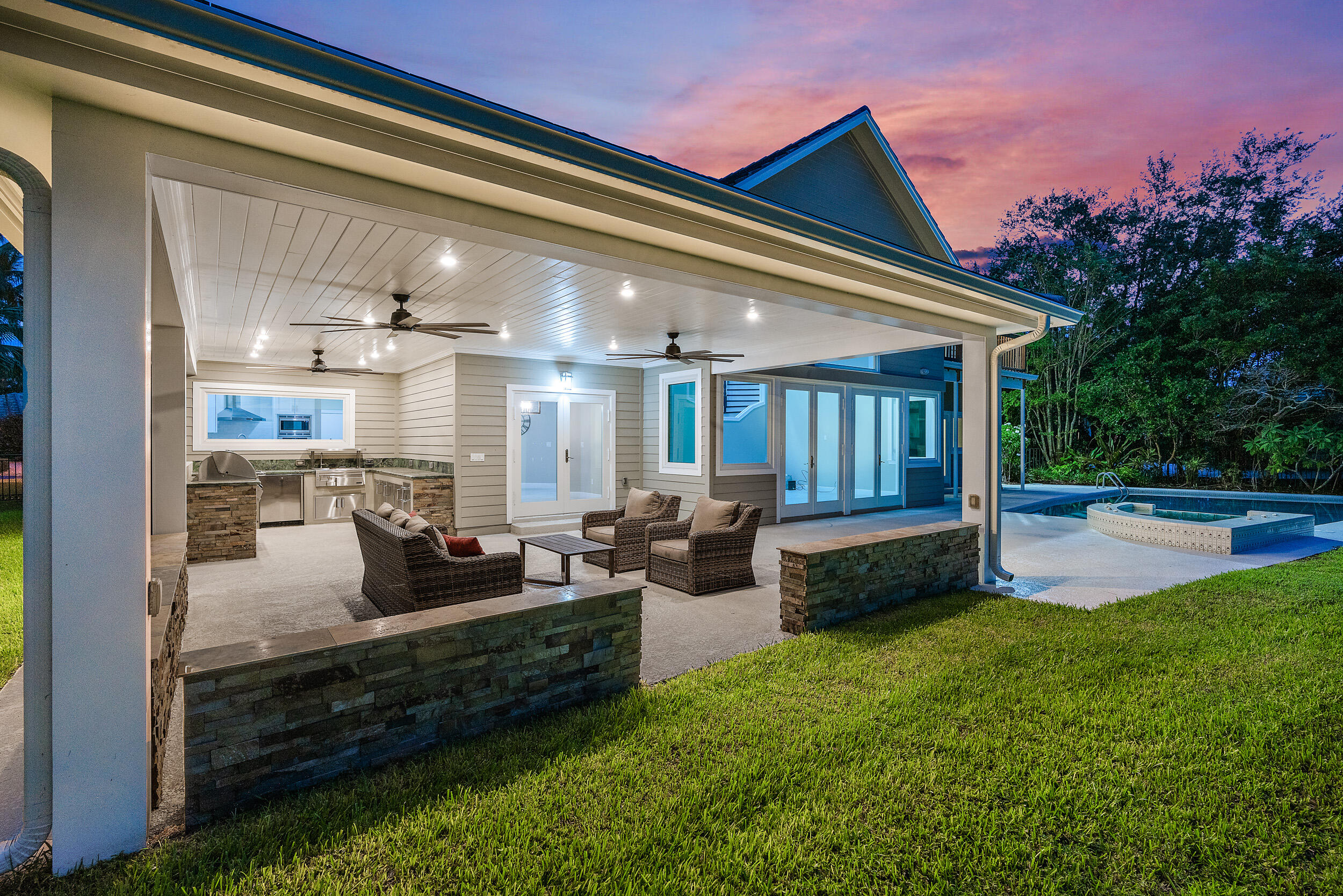 18169 Southeast Ridgeview Drive Tequesta, FL 33469 - Photo 10 of 51 a view of swimming pool with outdoor seating