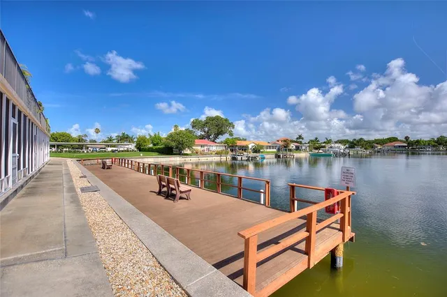 a view of swimming pool with a lake view
