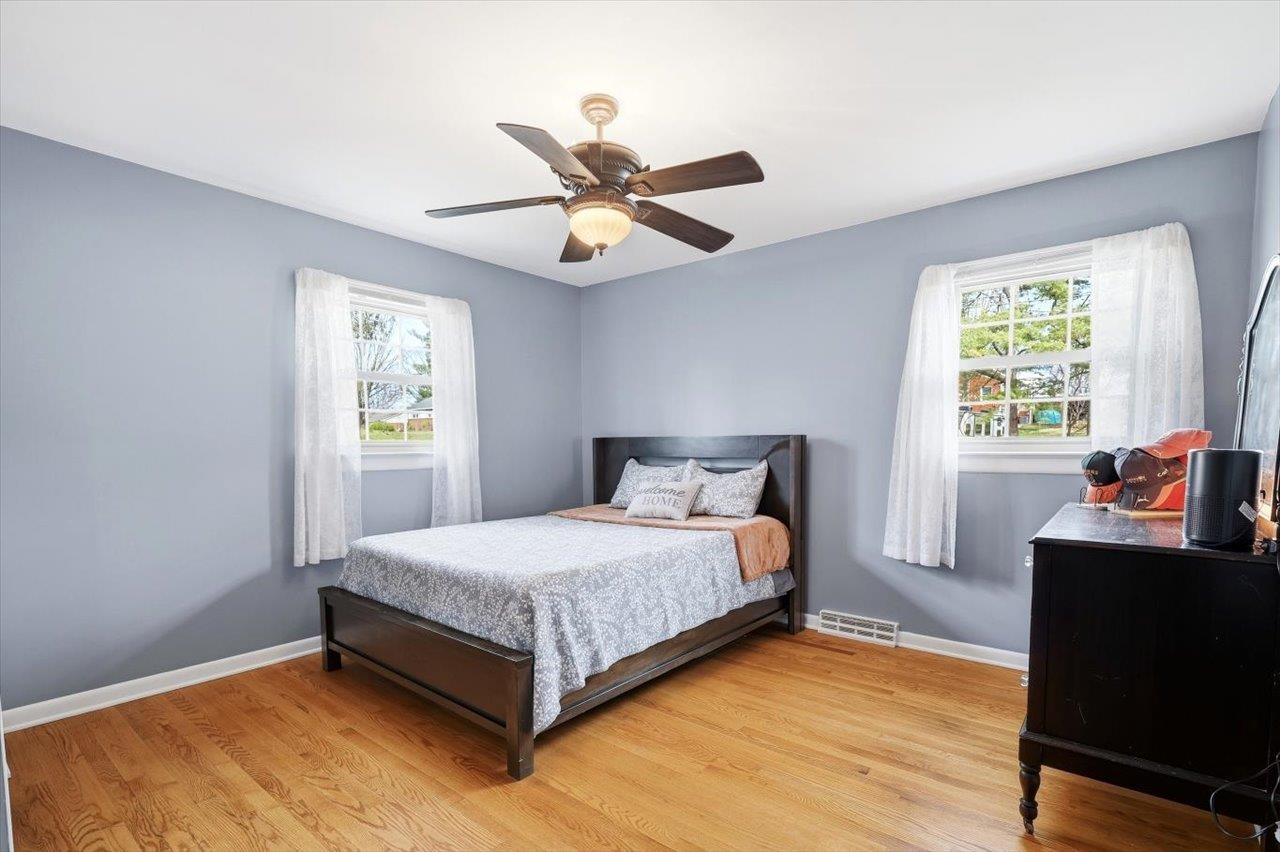 408 Robin Street Staunton, VA 24401 - Photo 14 of 52 a bedroom with a bed and a window