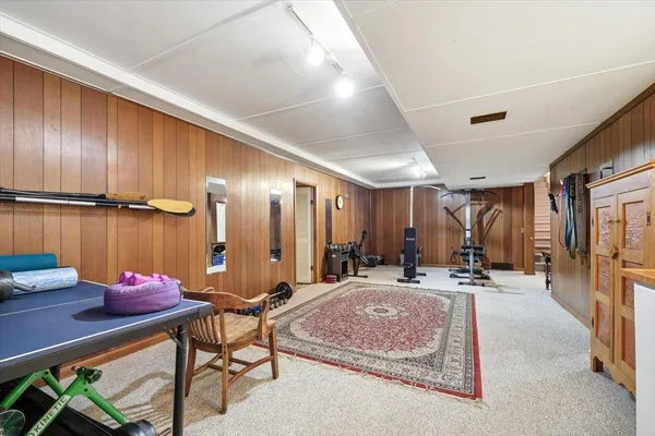 a view of a workspace with furniture and a livingroom