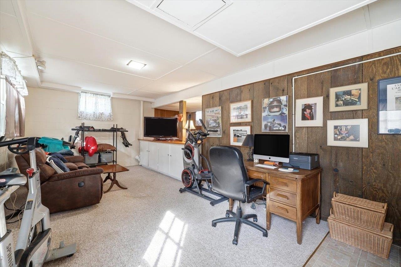408 Robin Street Staunton, VA 24401 - Photo 27 of 52 a view of a workspace with furniture and a livingroom