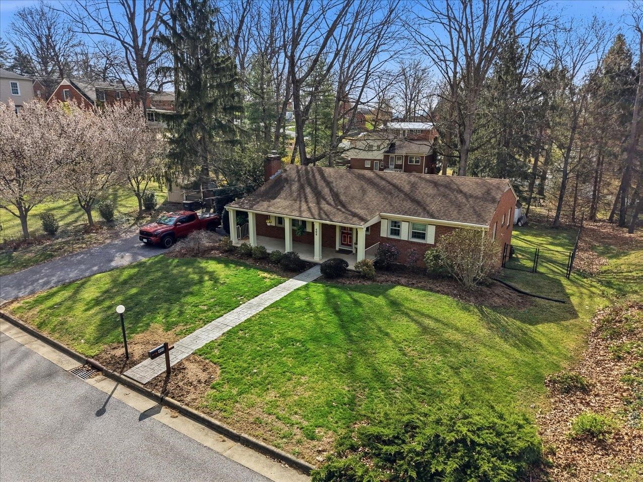 408 Robin Street Staunton, VA 24401 - Photo 45 of 52 a aerial view of a house with swimming pool next to a yard