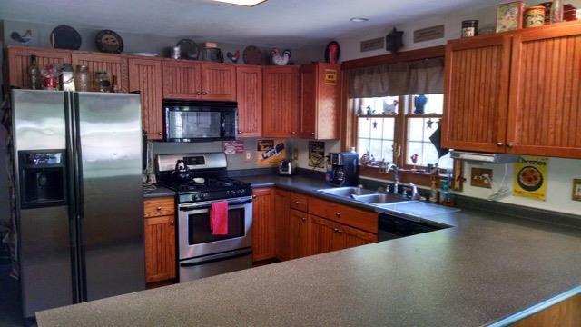 552 Durgintown Road Hiram, ME 04041 - Photo 2 of 24 This modern kitchen with breakfast...