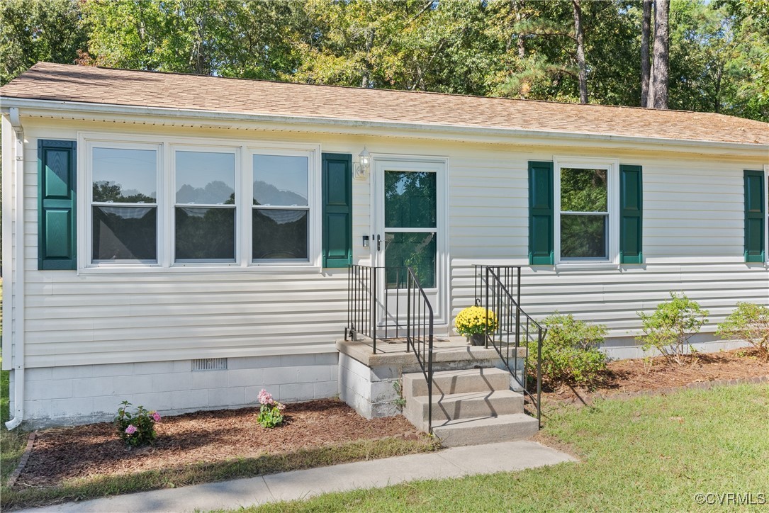 14830 Nash Road Chesterfield, VA 23838 - Photo 3 of 30 a view of a house with backyard and sitting area