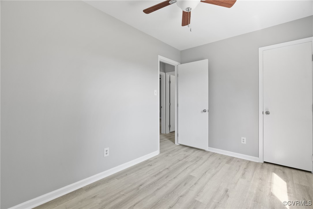 14830 Nash Road Chesterfield, VA 23838 - Photo 10 of 30 an empty room with wooden floor and windows