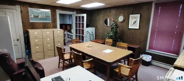 a view of a dining room with furniture