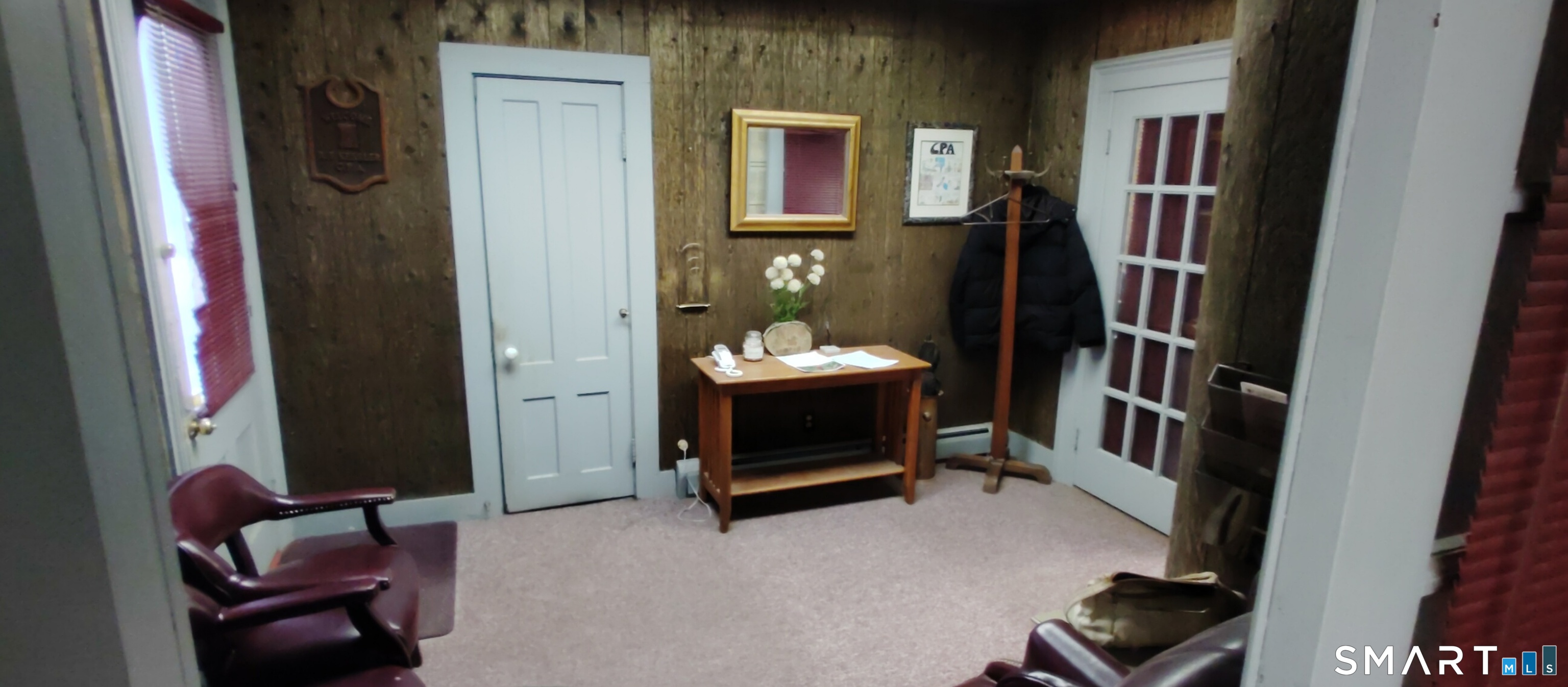 200 West Main Street Meriden, CT 06451 - Photo 16 of 53 a room with furniture and a chair