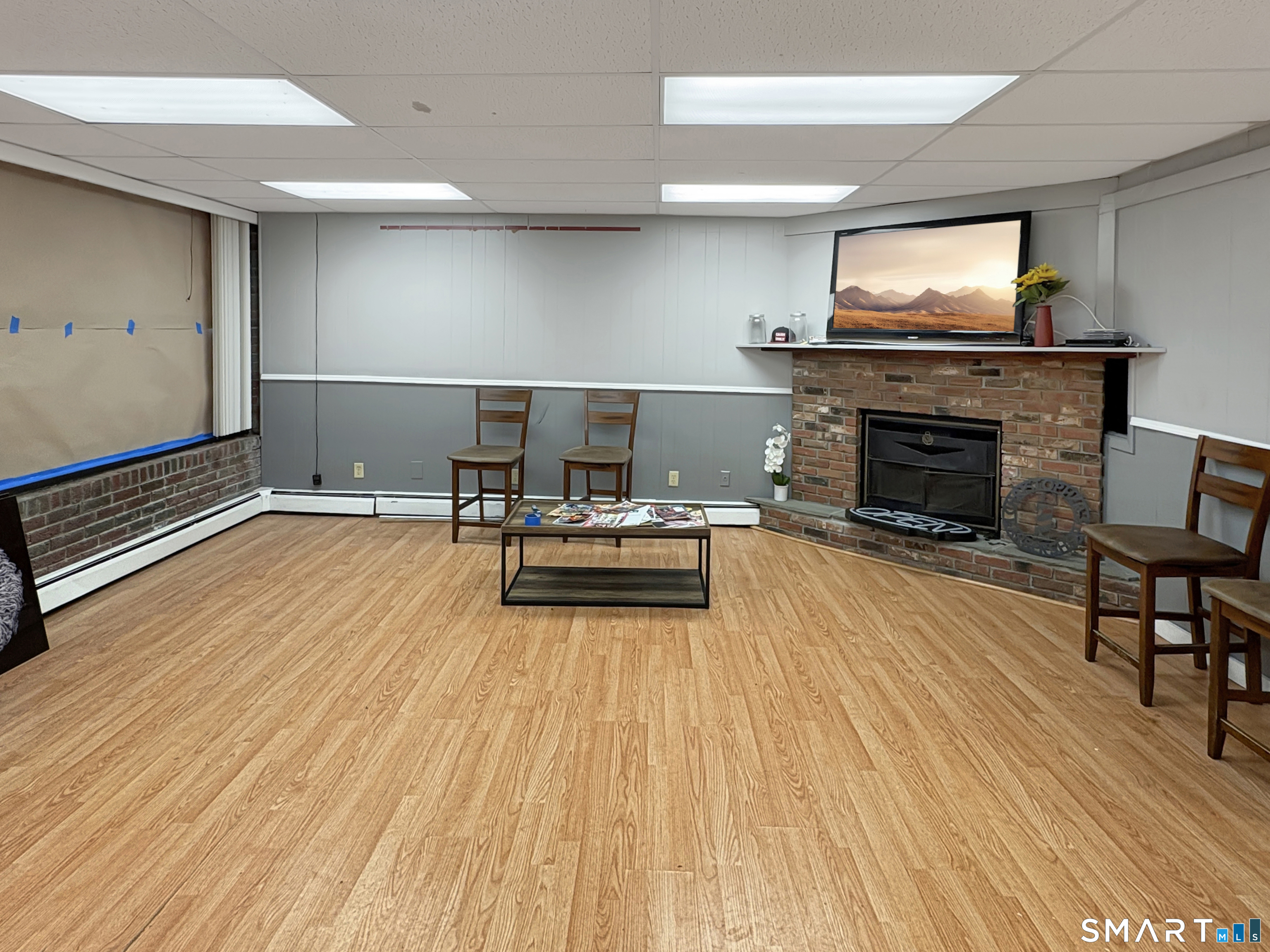 200 West Main Street Meriden, CT 06451 - Photo 19 of 53 a living room with furniture and a fireplace