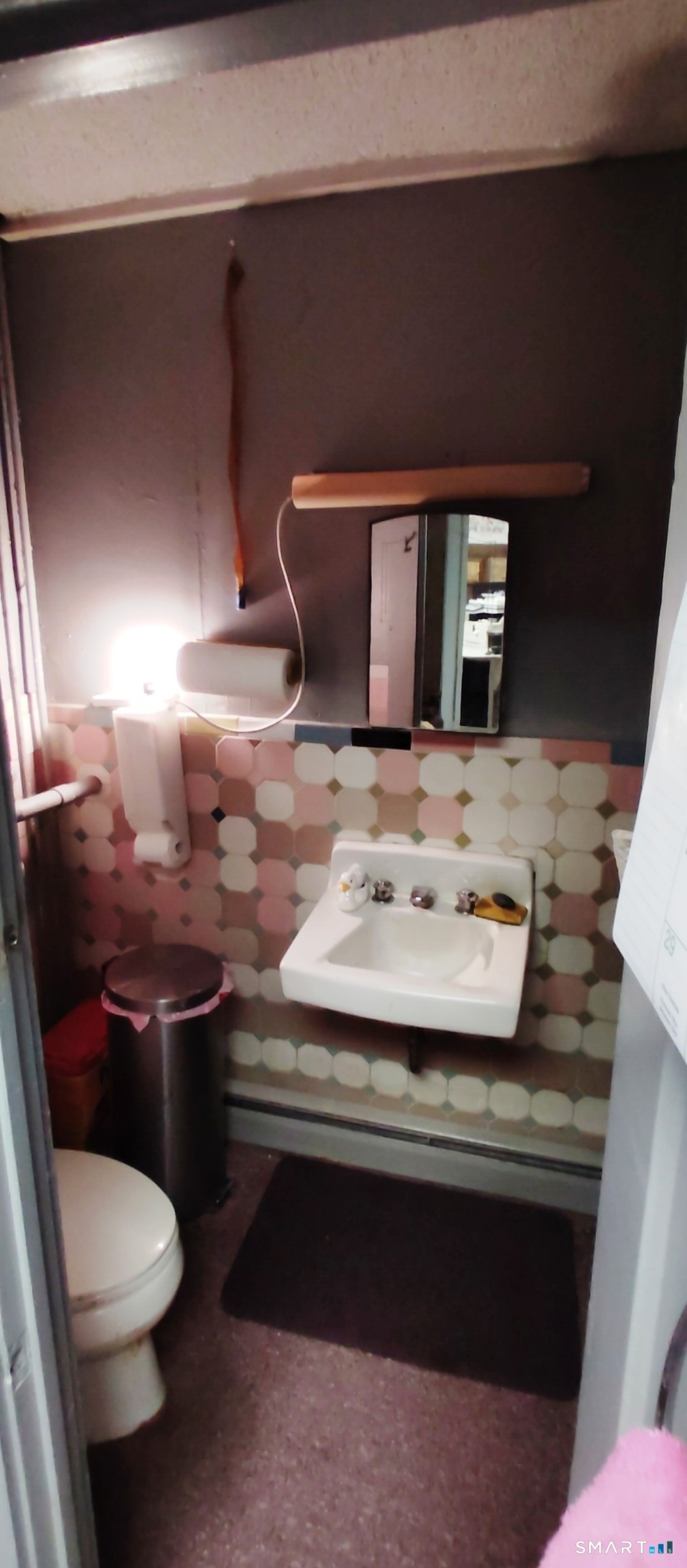 200 West Main Street Meriden, CT 06451 - Photo 21 of 53 a bathroom with a sink and a toilet