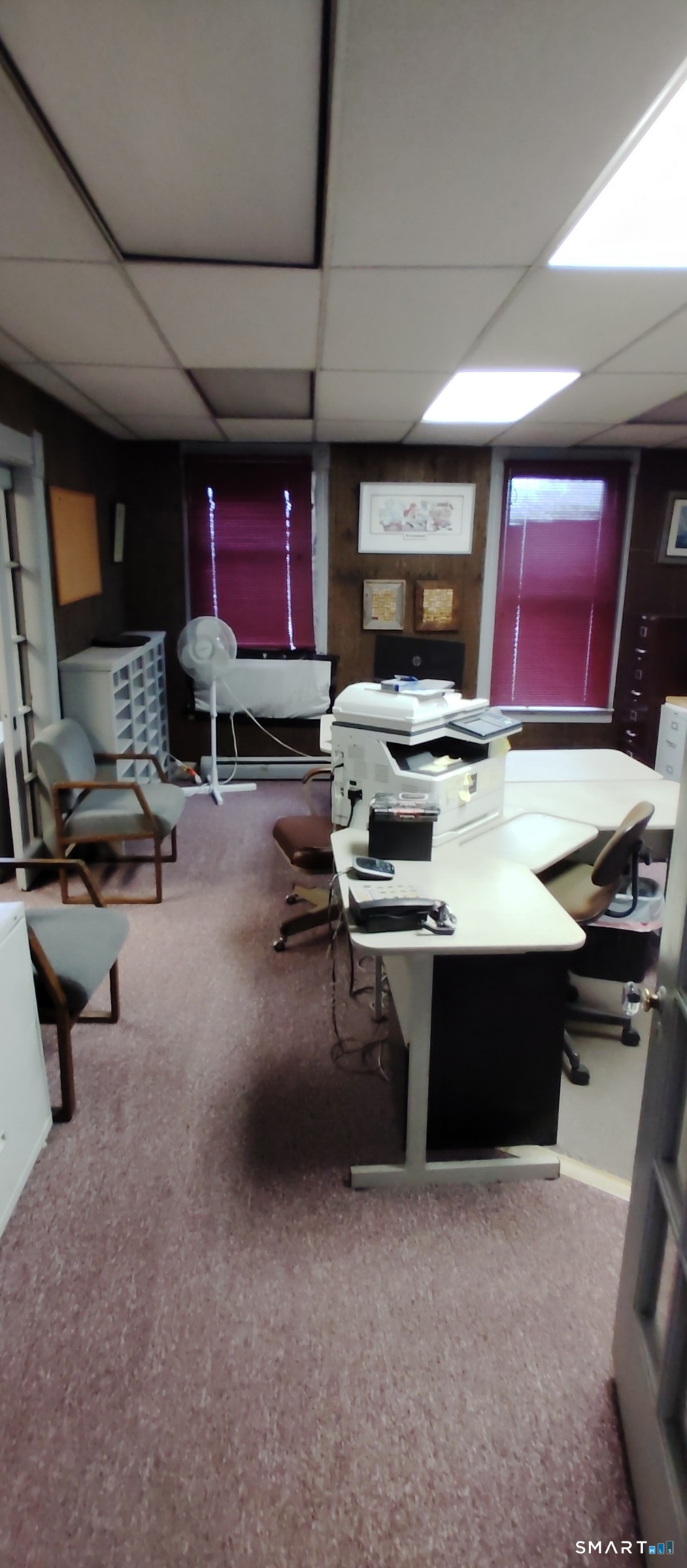 200 West Main Street Meriden, CT 06451 - Photo 22 of 53 a living room with furniture a flat screen tv and a fireplace