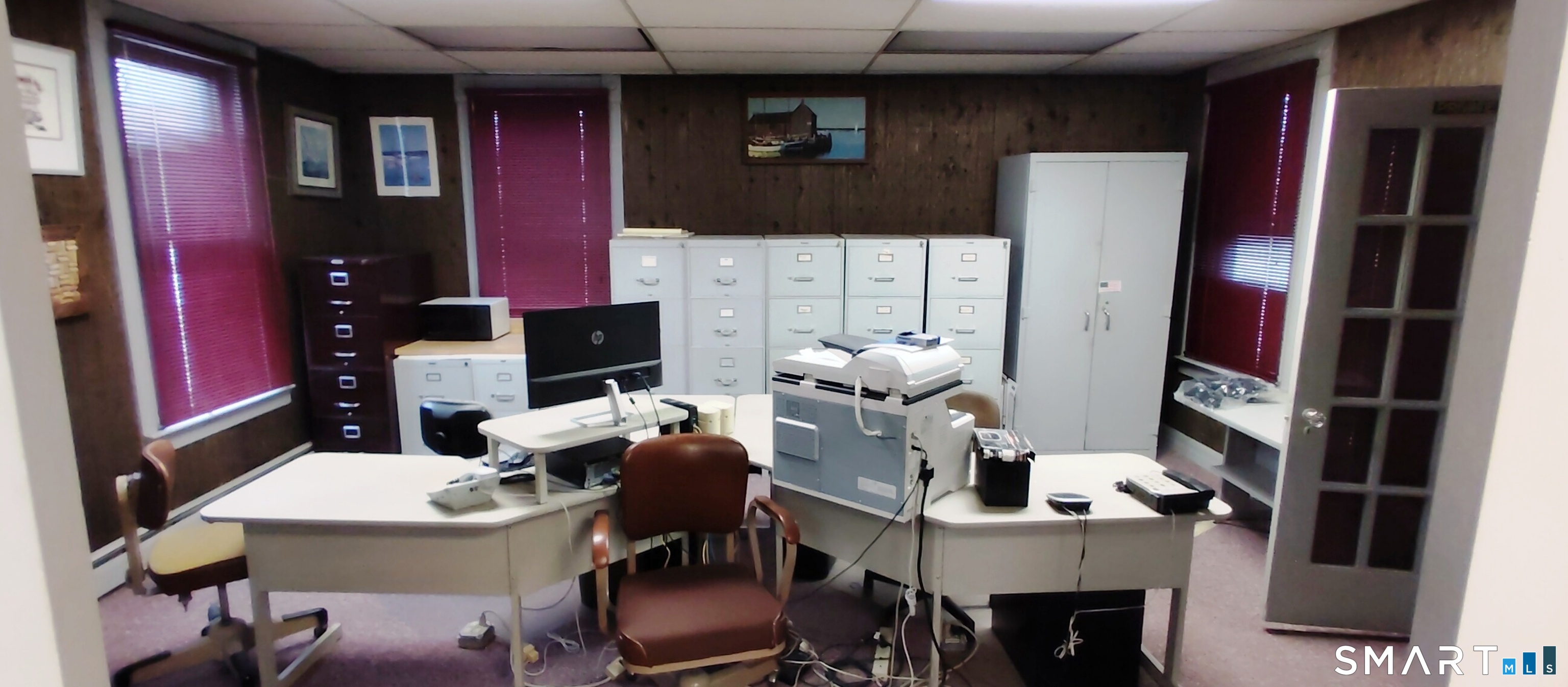200 West Main Street Meriden, CT 06451 - Photo 24 of 53 a living room with furniture a flat screen tv and kitchen view