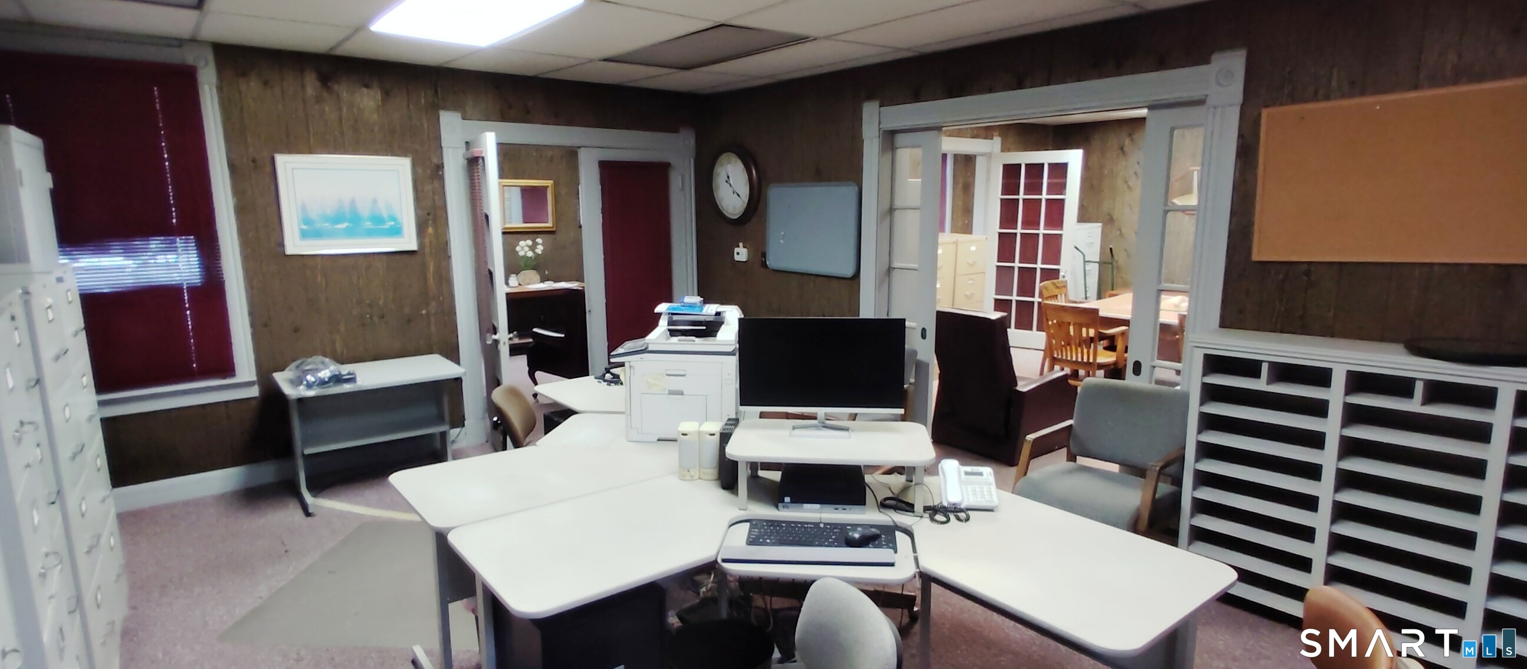 200 West Main Street Meriden, CT 06451 - Photo 27 of 53 a living room with furniture a flat screen tv and a table