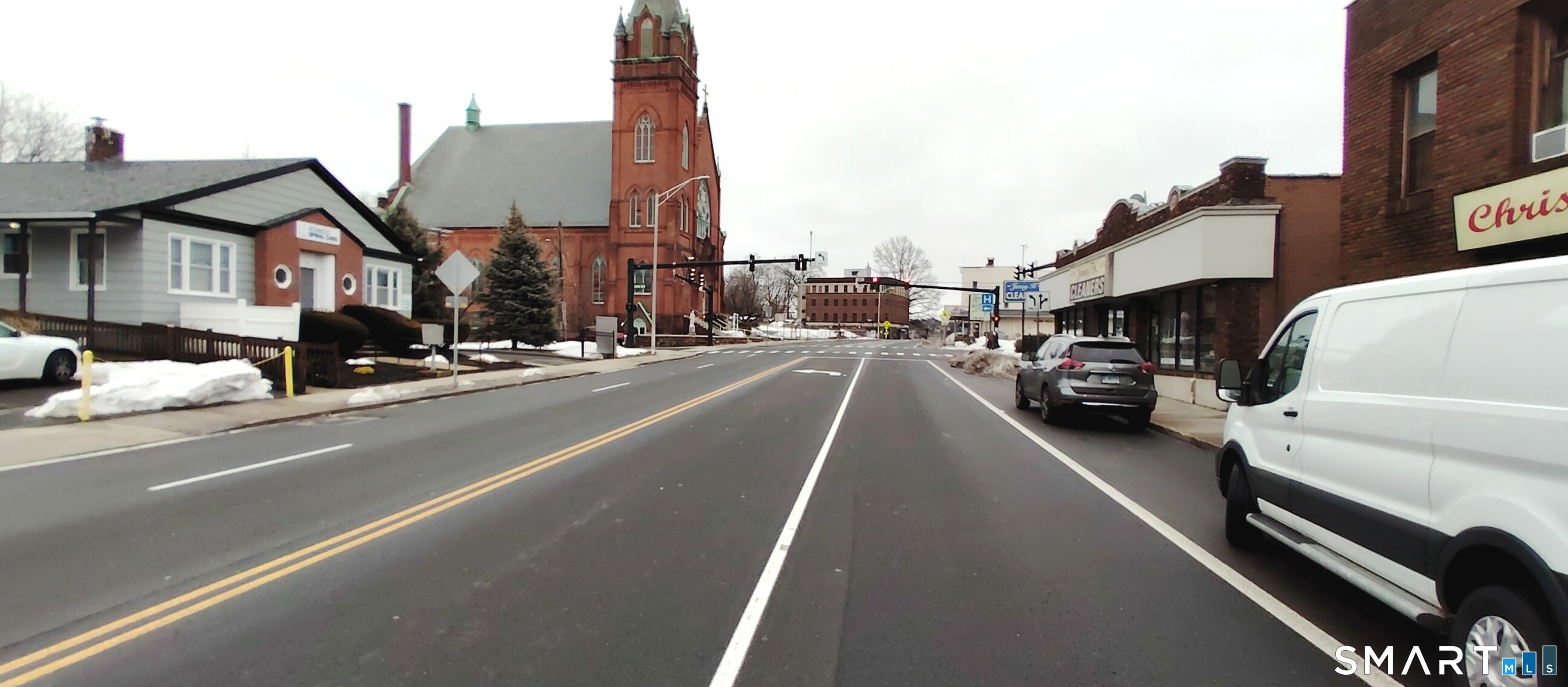 200 West Main Street Meriden, CT 06451 - Photo 31 of 53 a view of a city street with cars