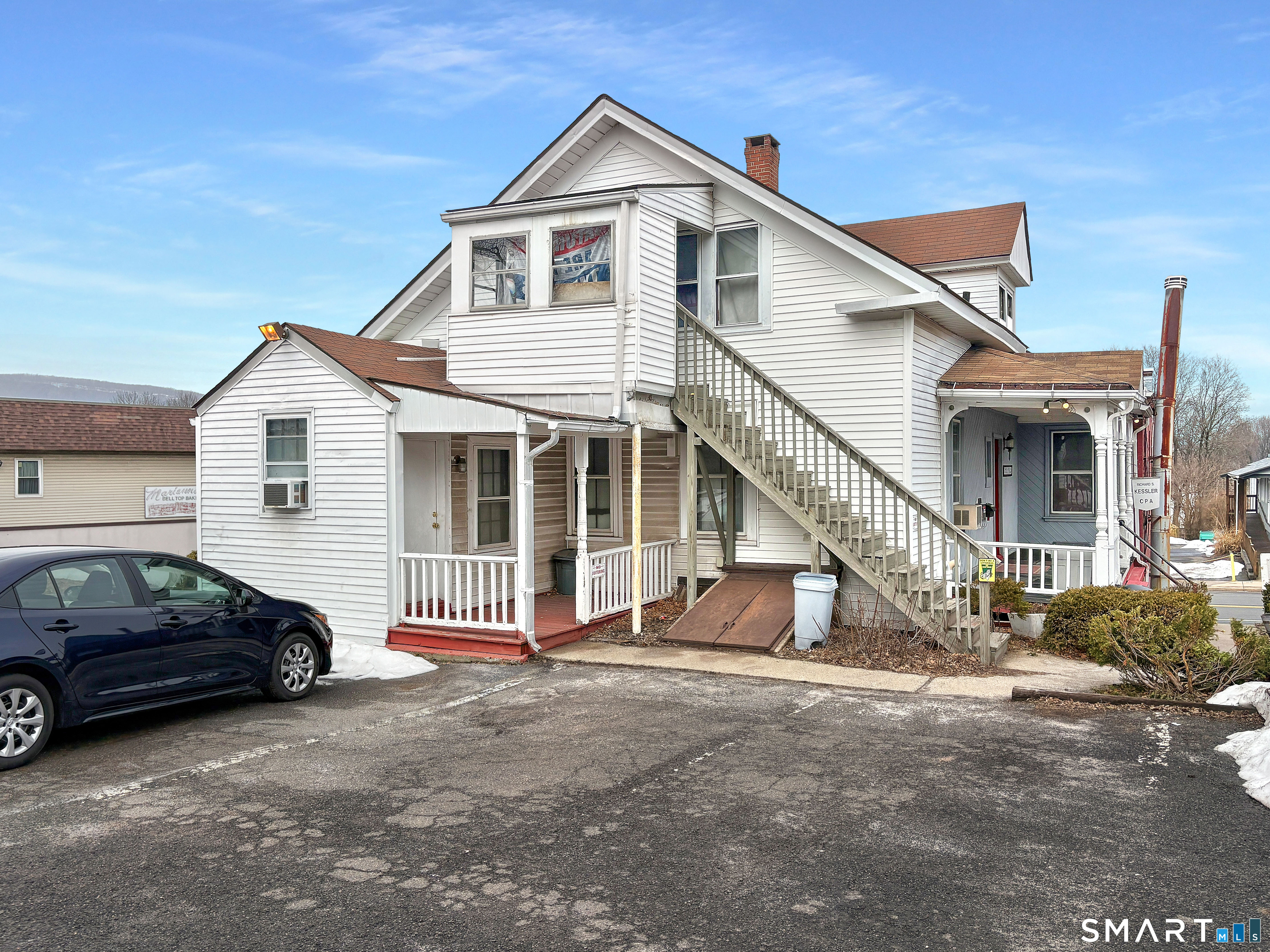 200 West Main Street Meriden, CT 06451 - Photo 37 of 53 a view of a house with a yard