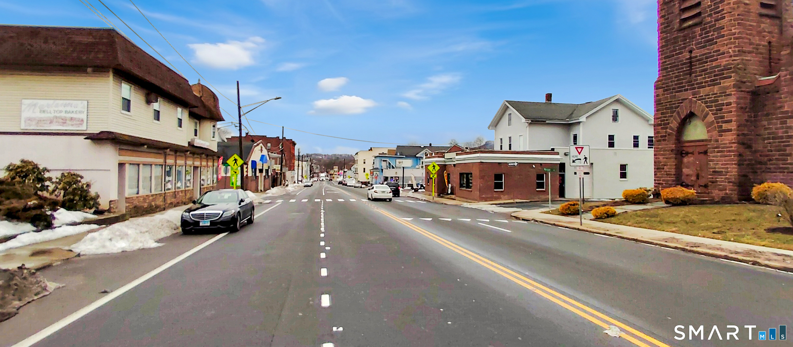 200 West Main Street Meriden, CT 06451 - Photo 39 of 53 a view of a street with cars