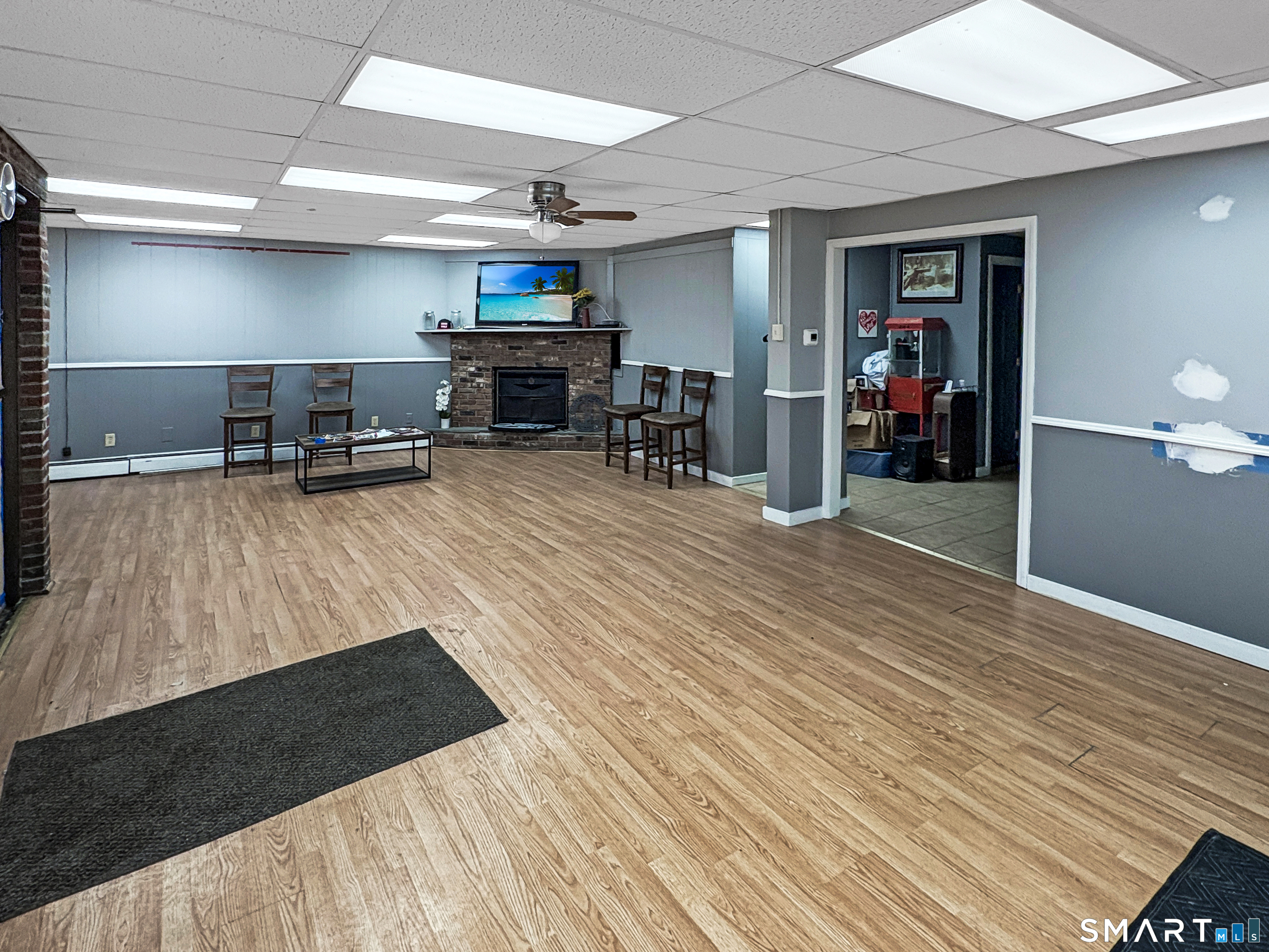 200 West Main Street Meriden, CT 06451 - Photo 4 of 53 a living room with furniture and a wooden floor