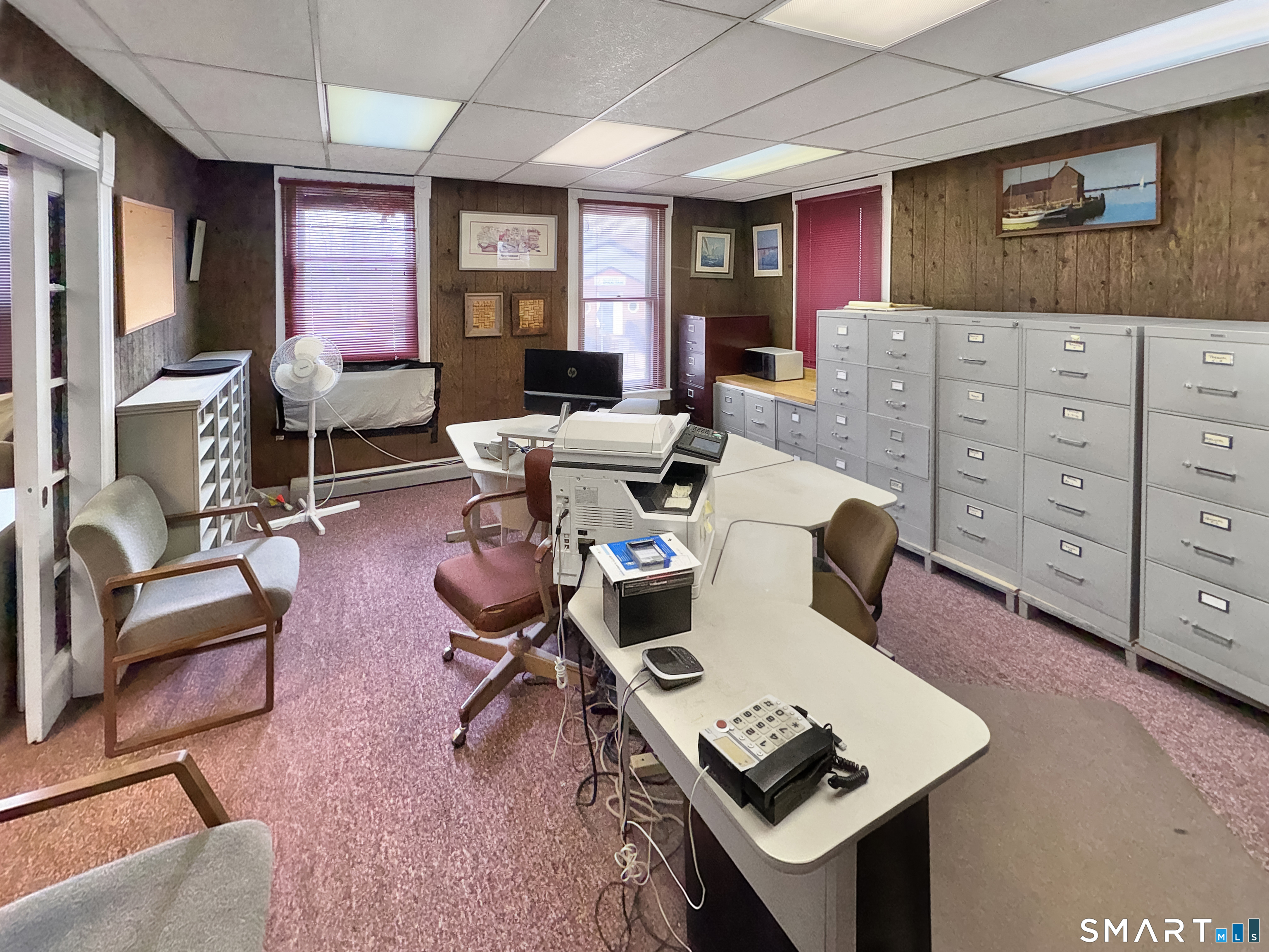 200 West Main Street Meriden, CT 06451 - Photo 45 of 53 a living room with furniture a flat screen tv and a table
