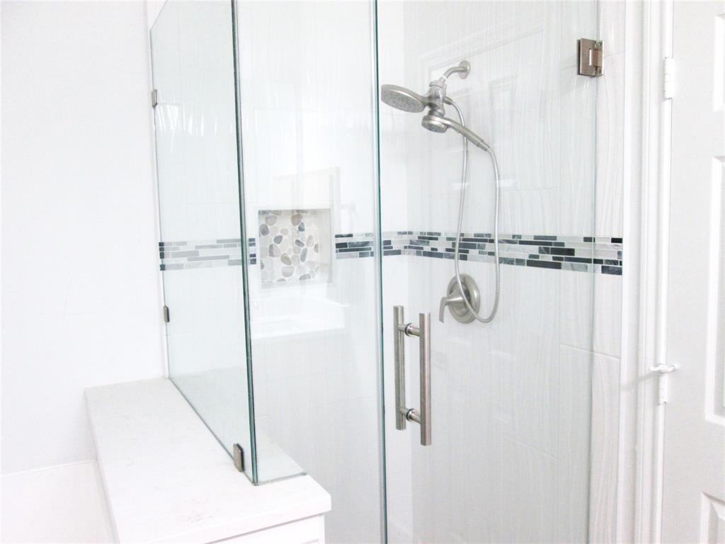 1305 Berkeley Court Plano, TX 75023 - Photo 10 of 34 a bathroom with a shower