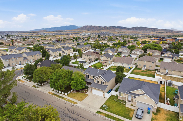 2223 North Pointe Meadow Loop Lehi, UT 84048 - Photo 51 of 56 Residential neighborhood featuring multiple single-family homes with pitched roofs and attached garages