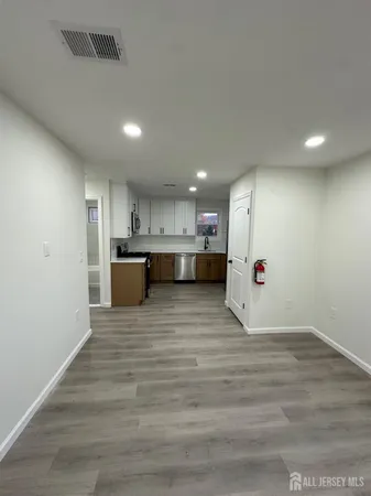 a view of kitchen and a window