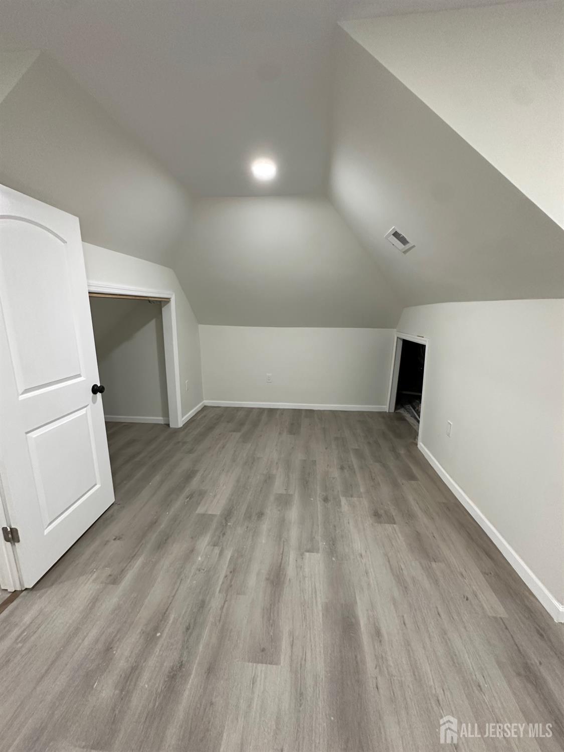 112 Fairview Avenue, Unit 2 Middlesex, NJ 08846 - Photo 20 of 29 a view of empty room with wooden floor