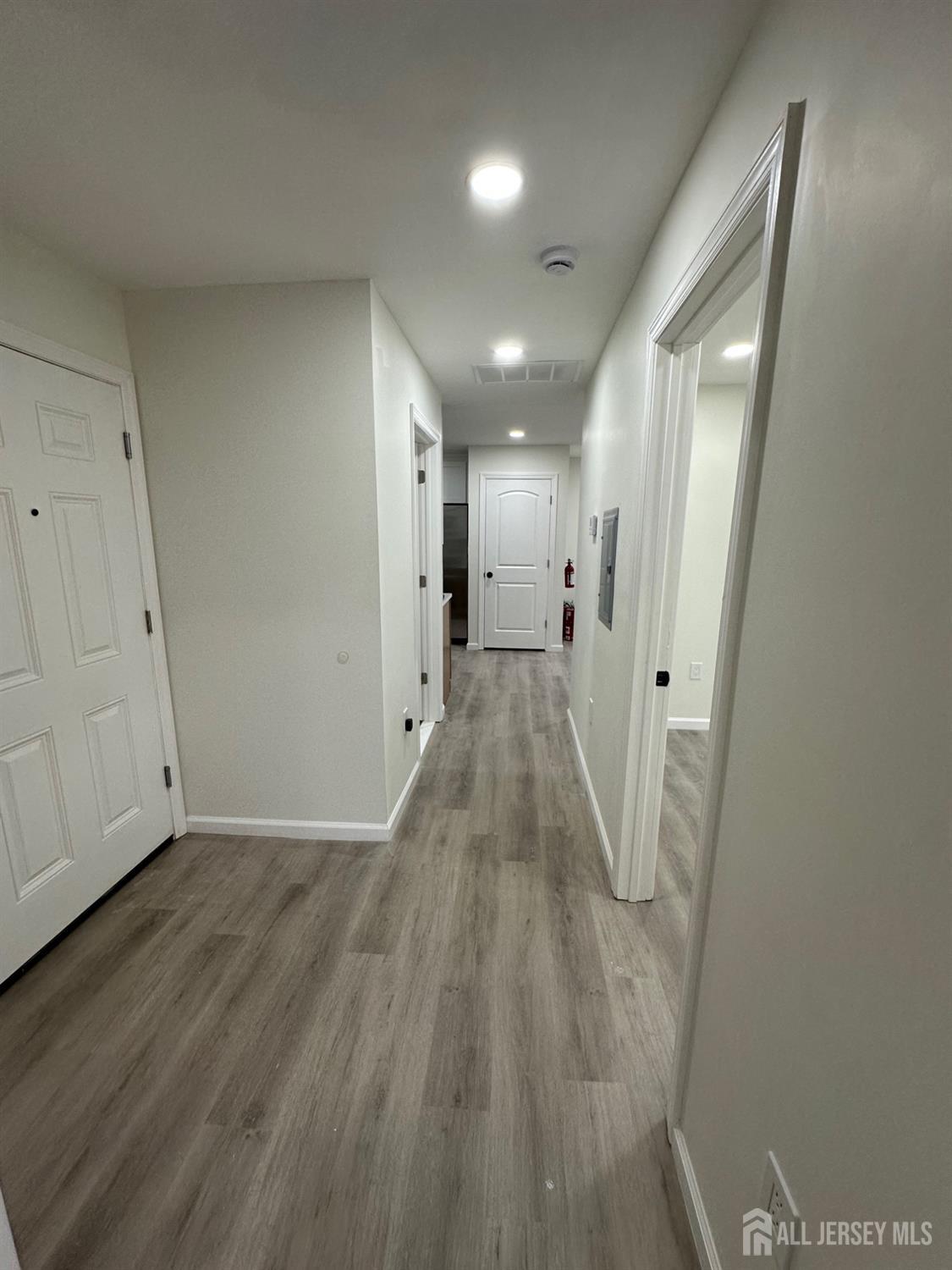 112 Fairview Avenue, Unit 2 Middlesex, NJ 08846 - Photo 5 of 29 a view of a hallway with wooden floor