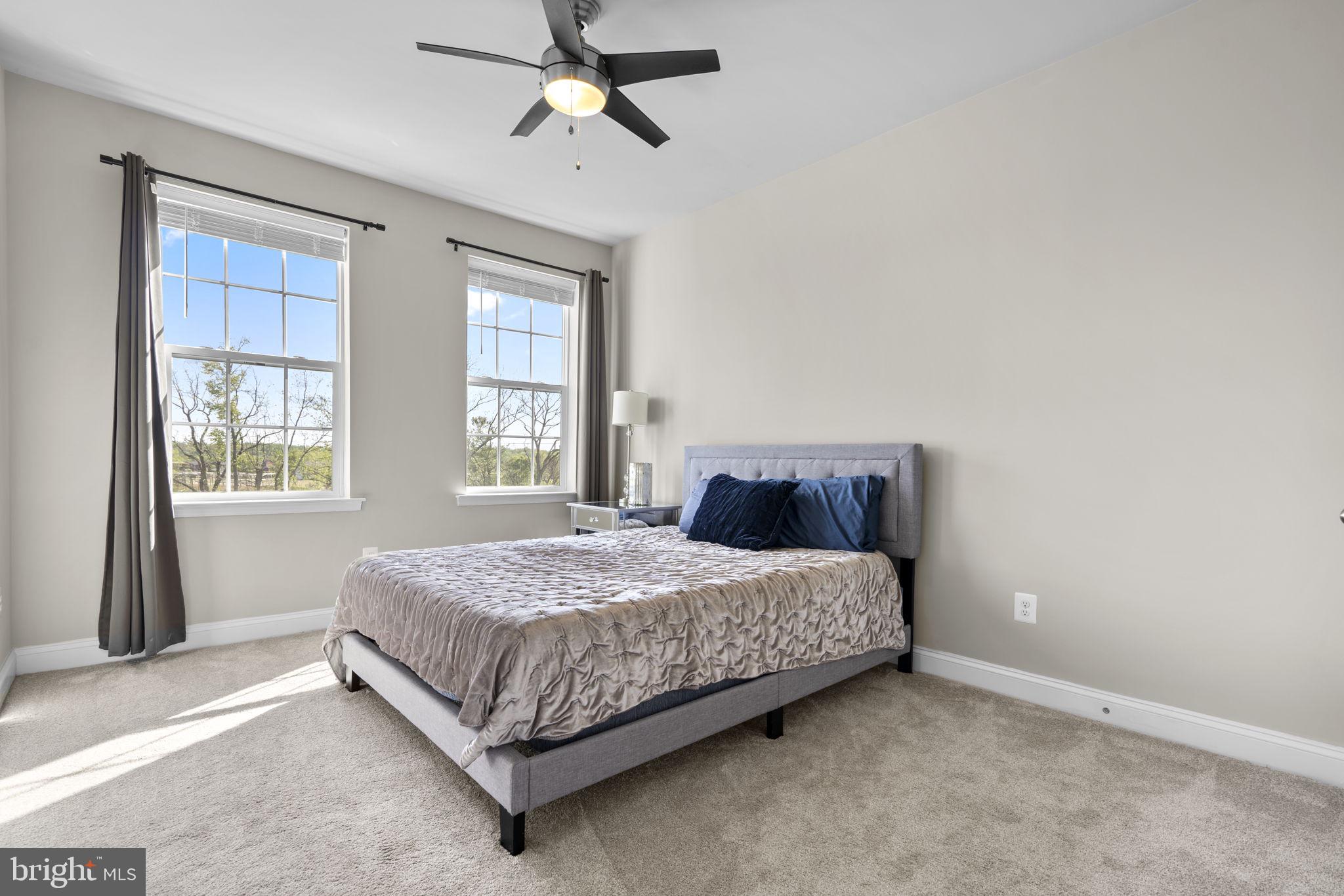 19723 Zion Road Brookeville, MD 20833 - Photo 45 of 67 a bedroom with a bed and window