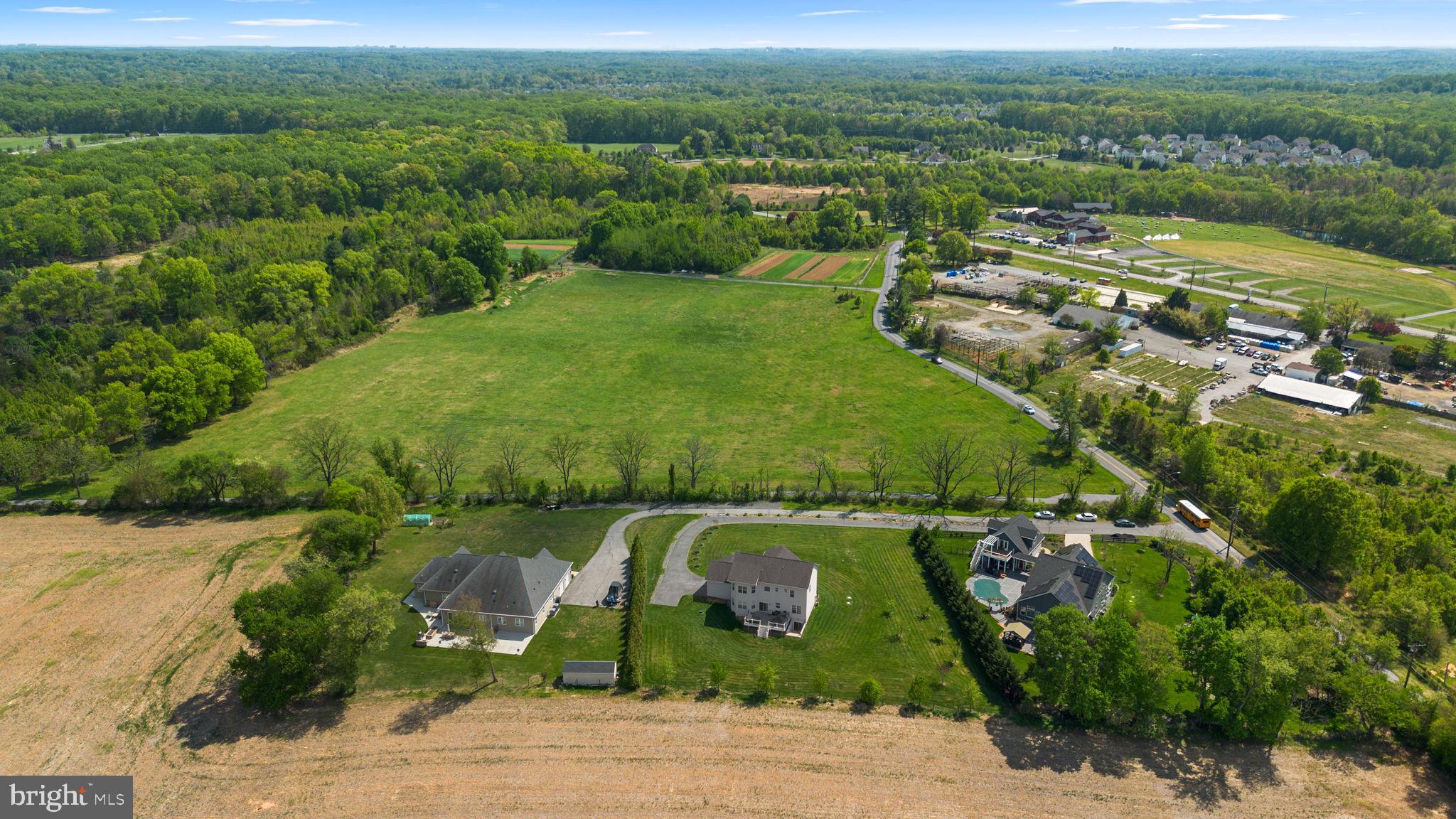 19723 Zion Road Brookeville, MD 20833 - Photo 64 of 67 an aerial view of a residential houses with outdoor space and trees