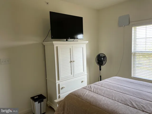 a bathroom with a sink a toilet and tub