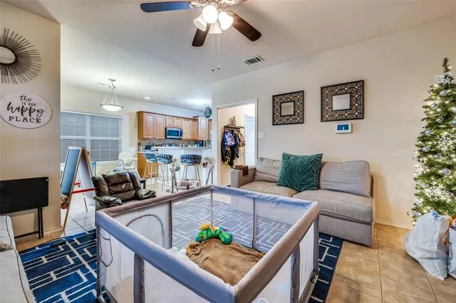 a kitchen with stainless steel appliances granite countertop a refrigerator stove and sink