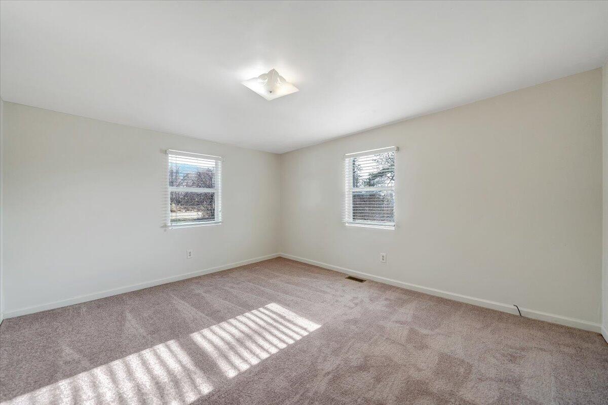 5549 Hollins Road Roanoke, VA 24019 - Photo 18 of 48 a view of an empty room with a window
