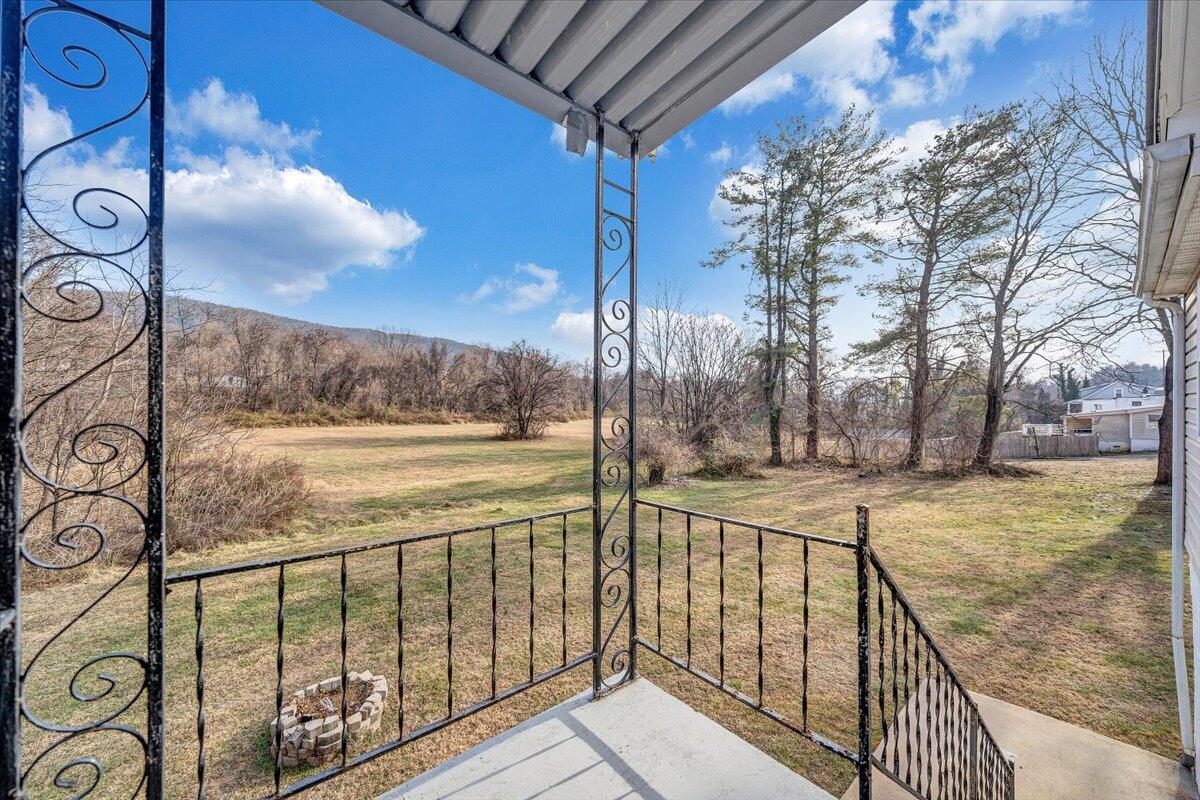 5549 Hollins Road Roanoke, VA 24019 - Photo 28 of 48 a view of a pathway with a wrought fence