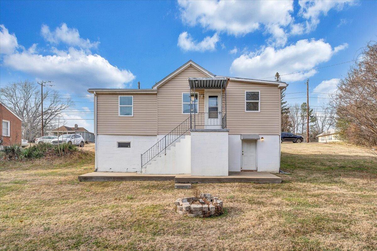 5549 Hollins Road Roanoke, VA 24019 - Photo 38 of 48 a view of a house with a yard