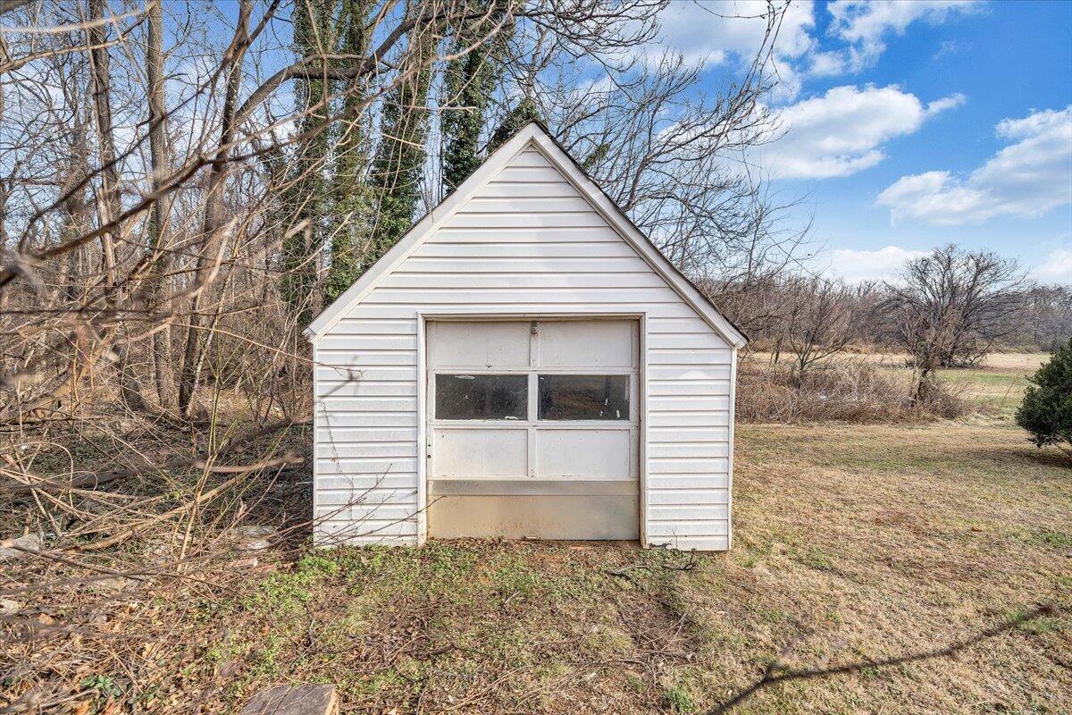 5549 Hollins Road Roanoke, VA 24019 - Photo 43 of 48 a view of a house with a yard
