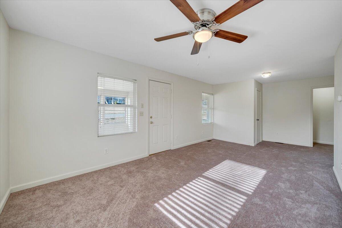 5549 Hollins Road Roanoke, VA 24019 - Photo 7 of 48 a view of an empty room with a window