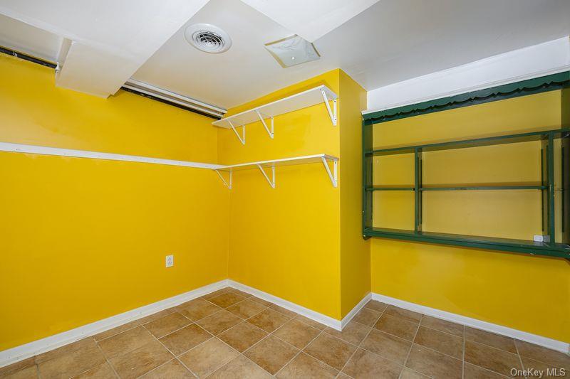 88 Innis Avenue Poughkeepsie, NY 12601 - Photo 21 of 25 a view of a big room with wooden floor