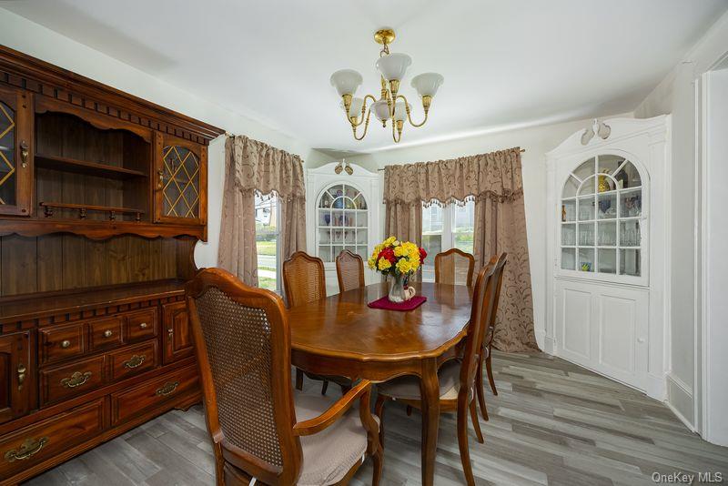 88 Innis Avenue Poughkeepsie, NY 12601 - Photo 9 of 25 a view of a dining room with furniture and window