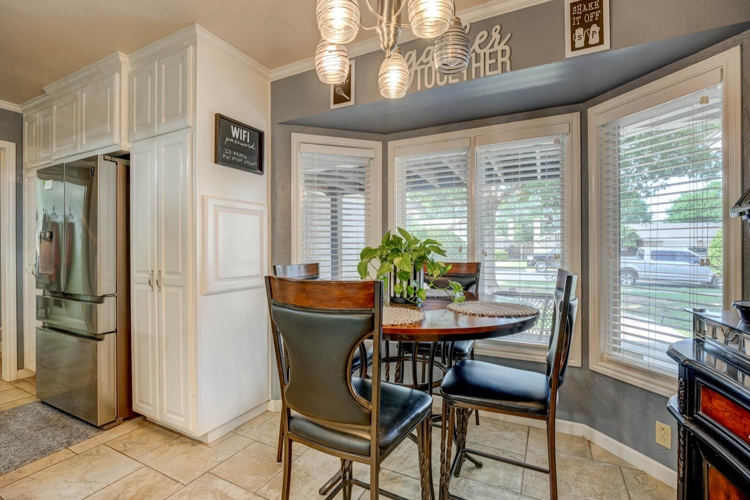 5229 91st Street Lubbock, TX 79424 - Photo 13 of 28 a dining room with furniture and window