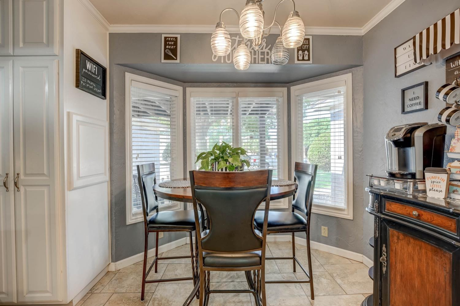 5229 91st Street Lubbock, TX 79424 - Photo 14 of 28 a view of a dining room with furniture window and outside view