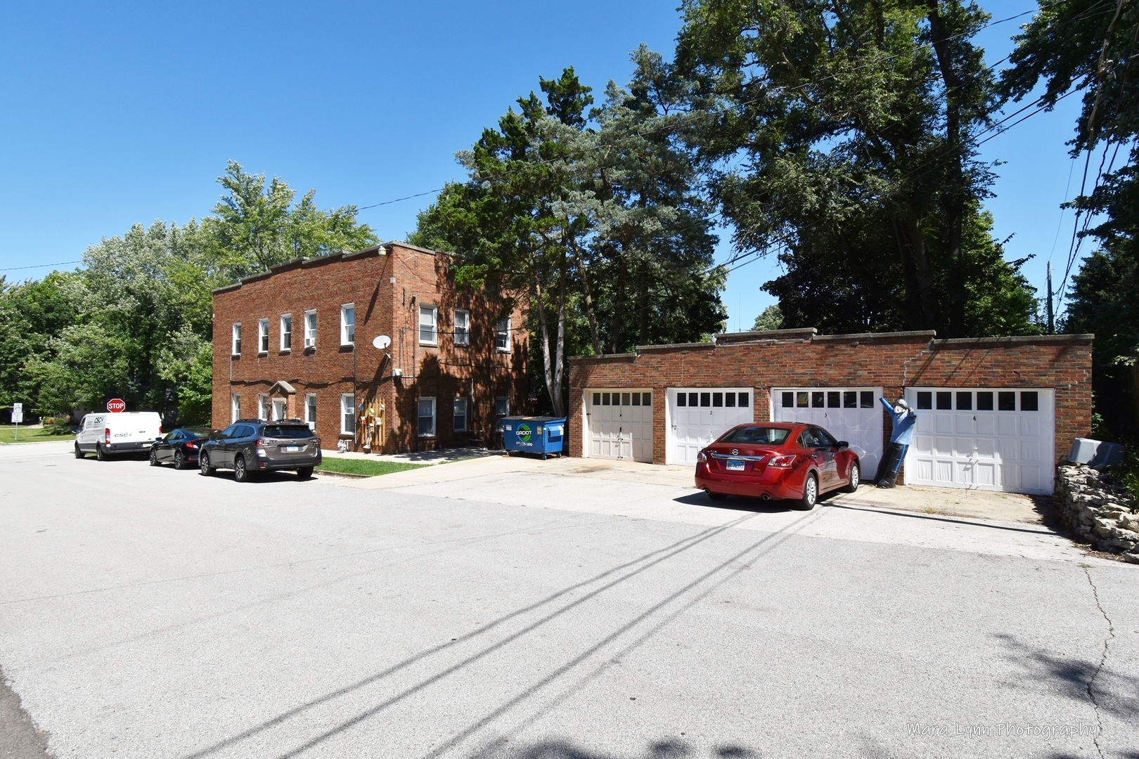 a view of a cars parked in front of a building